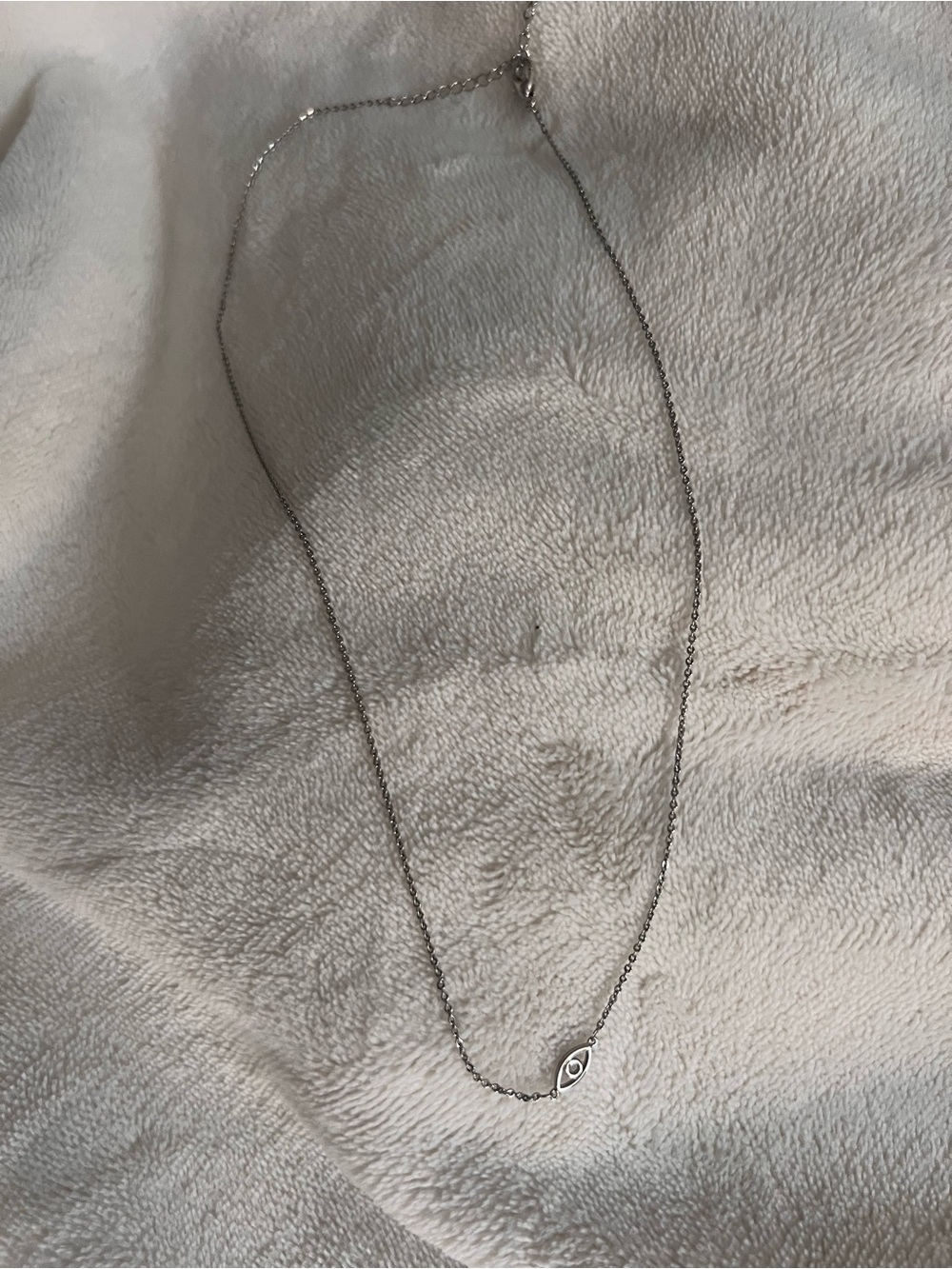 Silver tone eye necklace